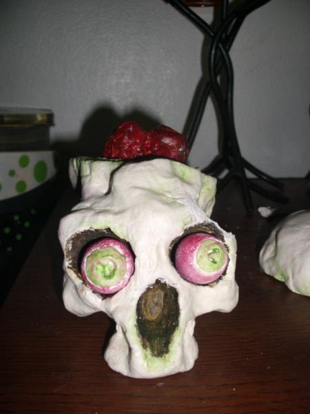 One of my first attempts into the world of clay.  The brain and eyes are removable.